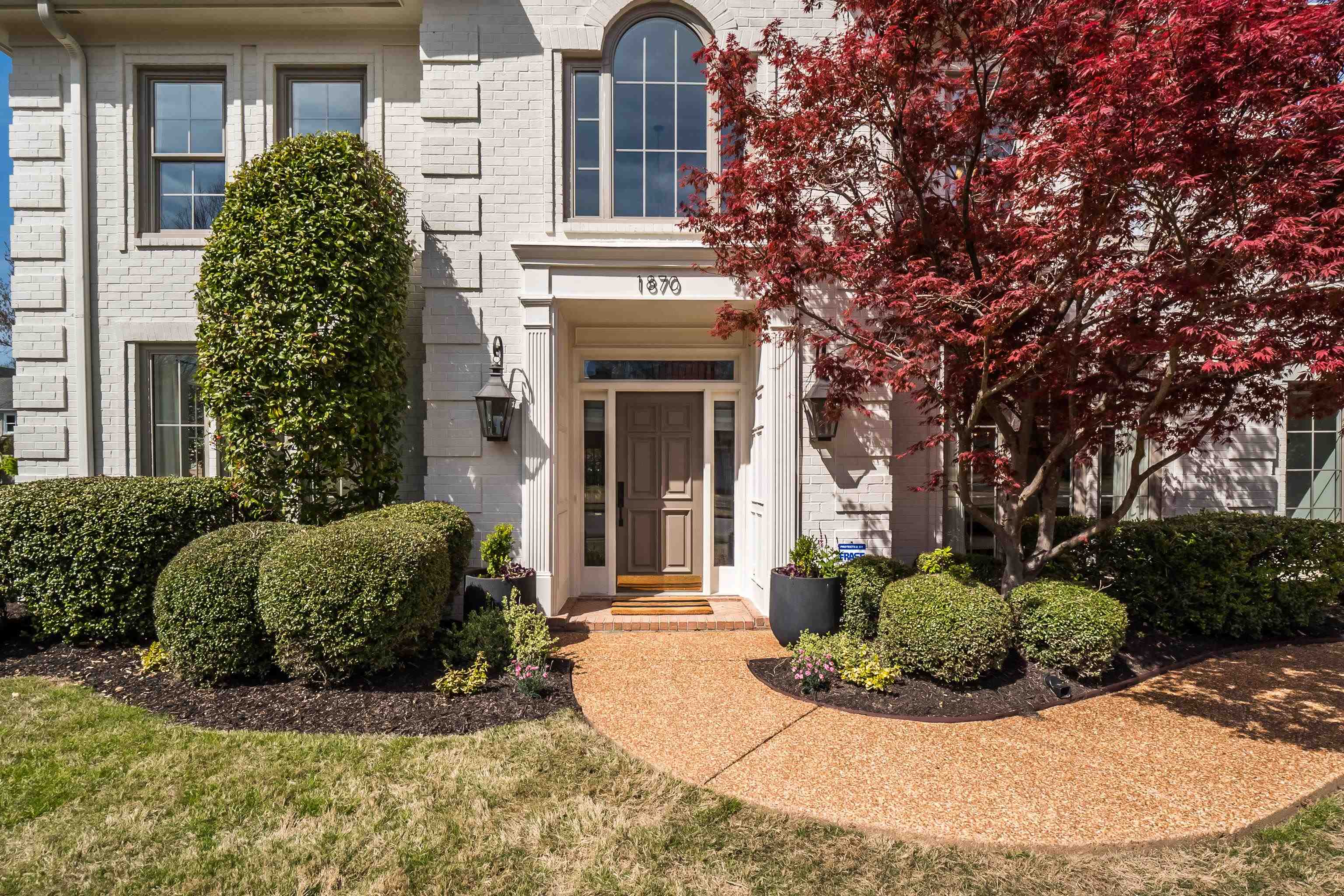 1870 Lonhill Drive Collierville, TN 38017 - Photo 3 of 34 a view of a house with a garden
