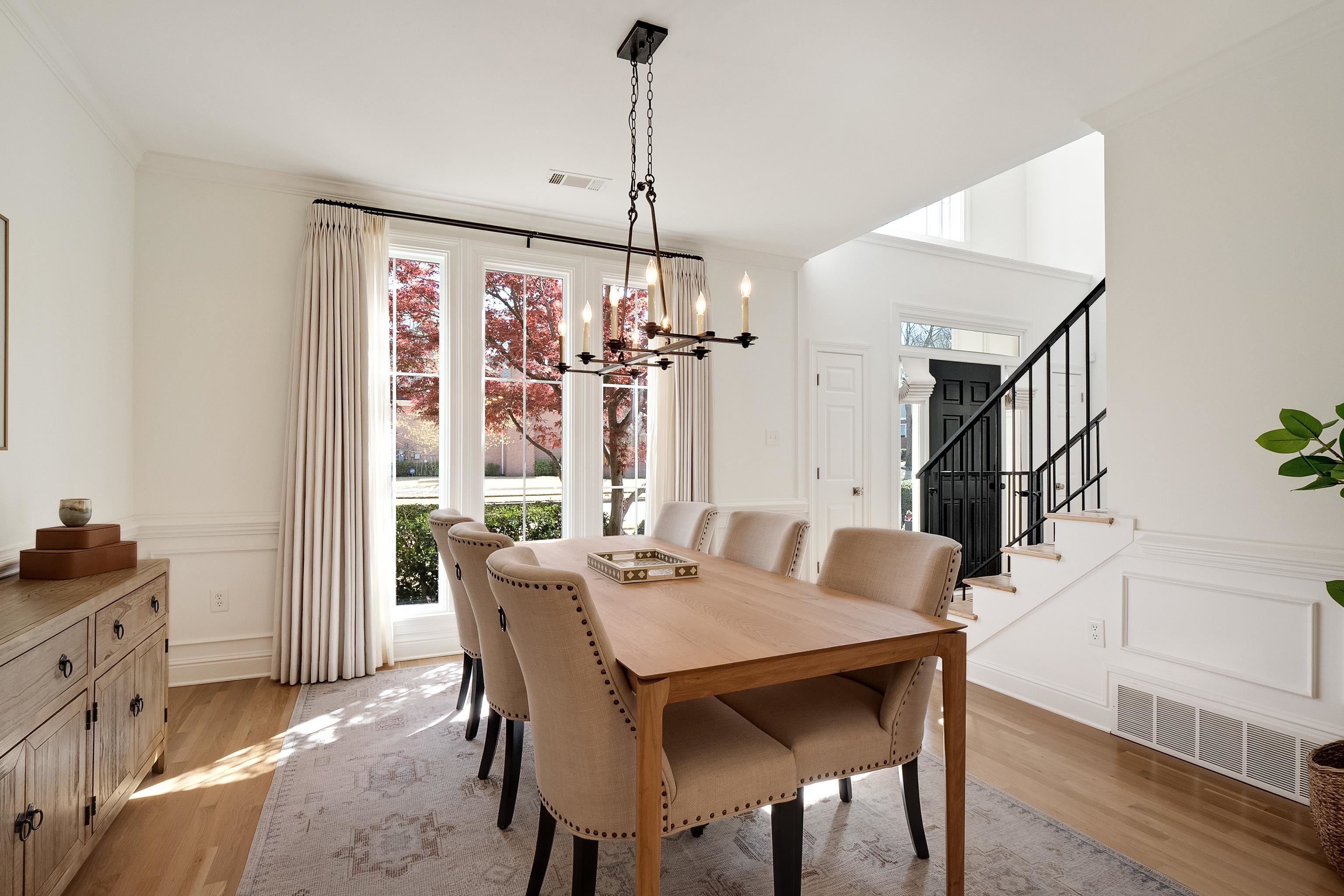 1870 Lonhill Drive Collierville, TN 38017 - Photo 7 of 34 a view of a dining room with furniture window and wooden floor