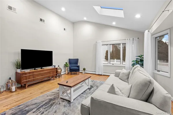 a view of a balcony with wooden floor and stairs