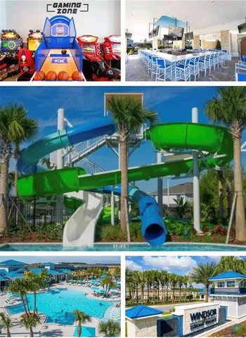 a view of swimming pool with a yard and plants