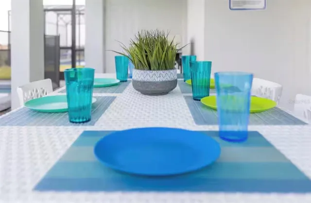 a view of a dining room with furniture