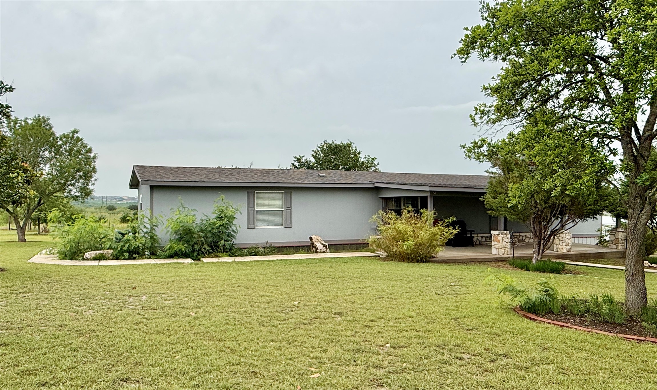 3075 FM 2001 Buda, TX 78610 - Photo 1 of 26 Welcome home to living life out in the country.