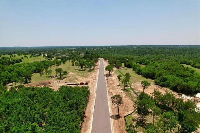a view of a water pond with green space