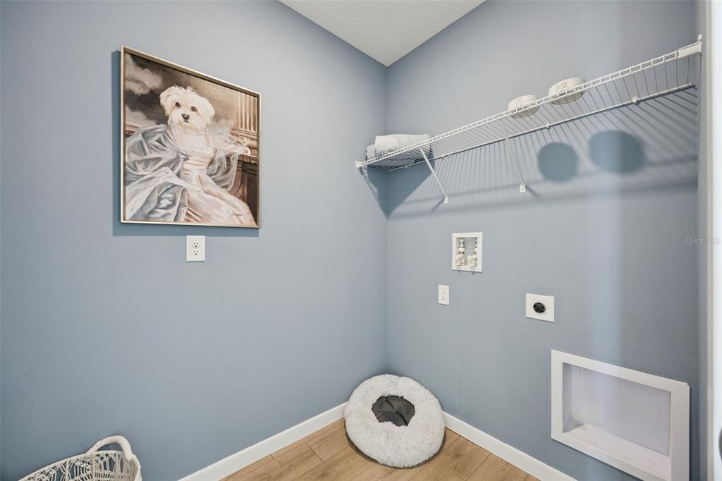 3019 House Finch Road St. Cloud, FL 34773 - Photo 16 of 54 a bathroom with a toilet and a shower