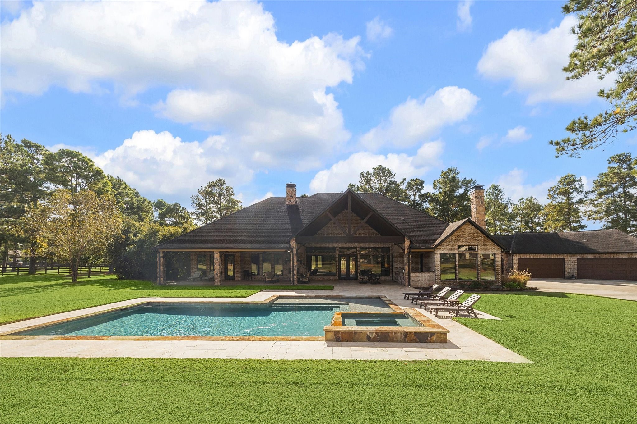 11 Willowcreek Ranch Road Tomball, TX 77377 - Photo 14 of 49 The 30,000 gallon sparkling heated pool and spa features an in floor cleaning system. It boasts a bathing shelf so it may be enjoyed by animals, small children at play and sun worshippers alike! It is edged in flagstone coping and features sub surface drainage!