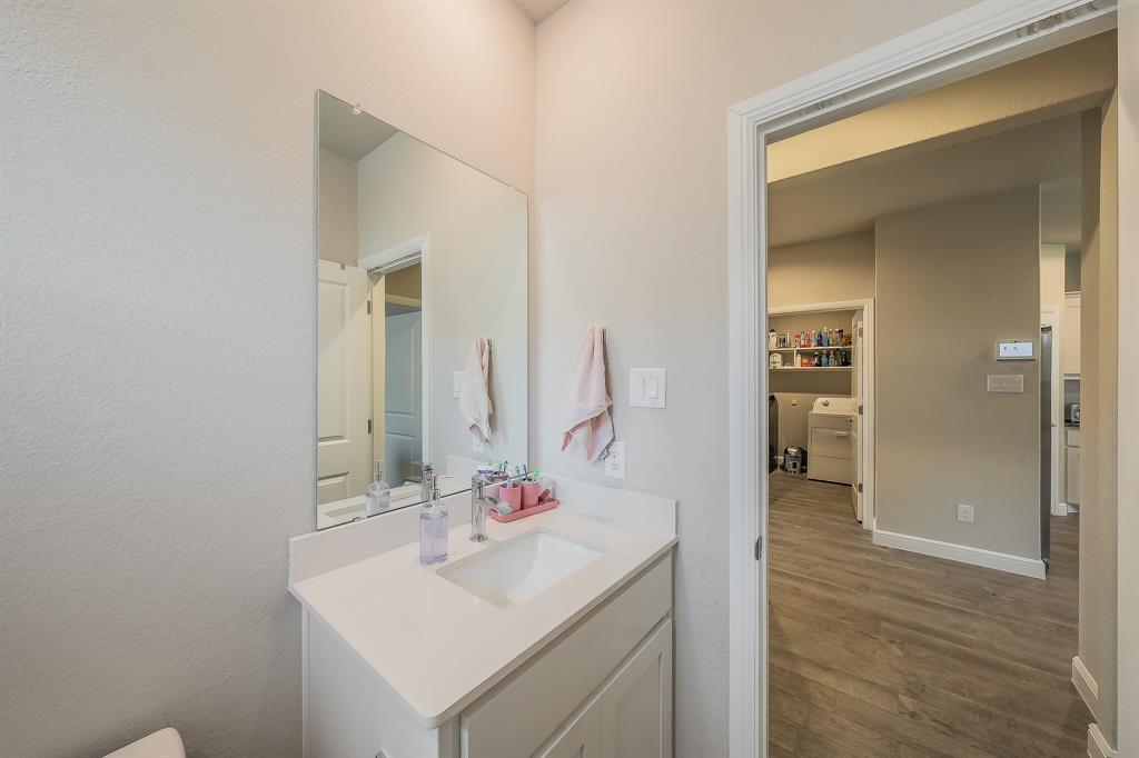 1212 Bosque Lane Weatherford, TX 76087 - Photo 17 of 38 a bathroom with a sink and a mirror