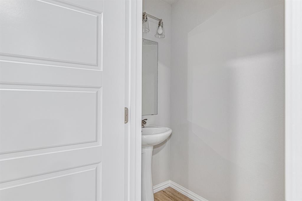 320 West Gambrell Street Fort Worth, TX 76115 - Photo 16 of 40 a bathroom with a sink