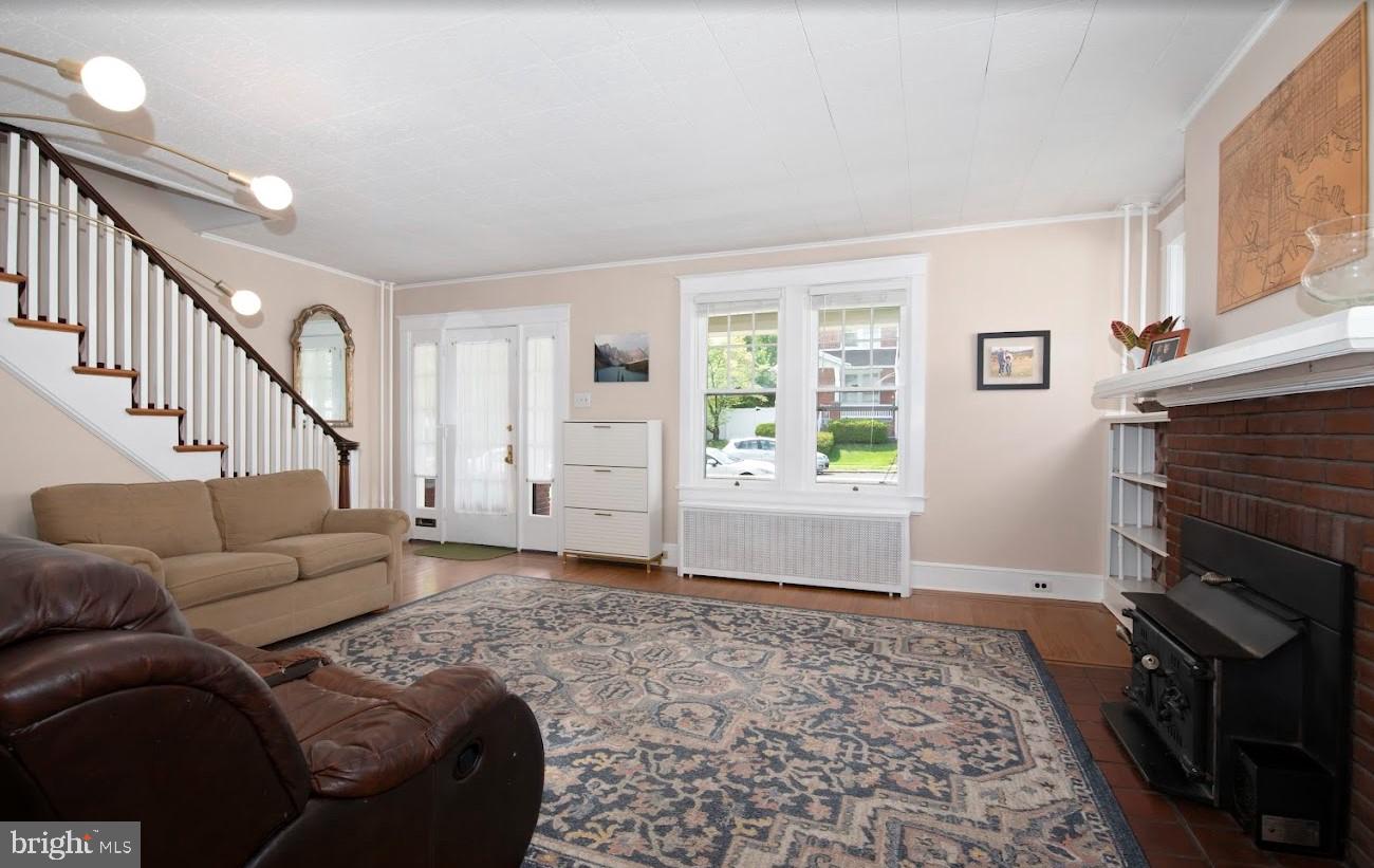 1505 3rd Avenue York, PA 17403 - Photo 3 of 12 a living room with furniture and a fireplace
