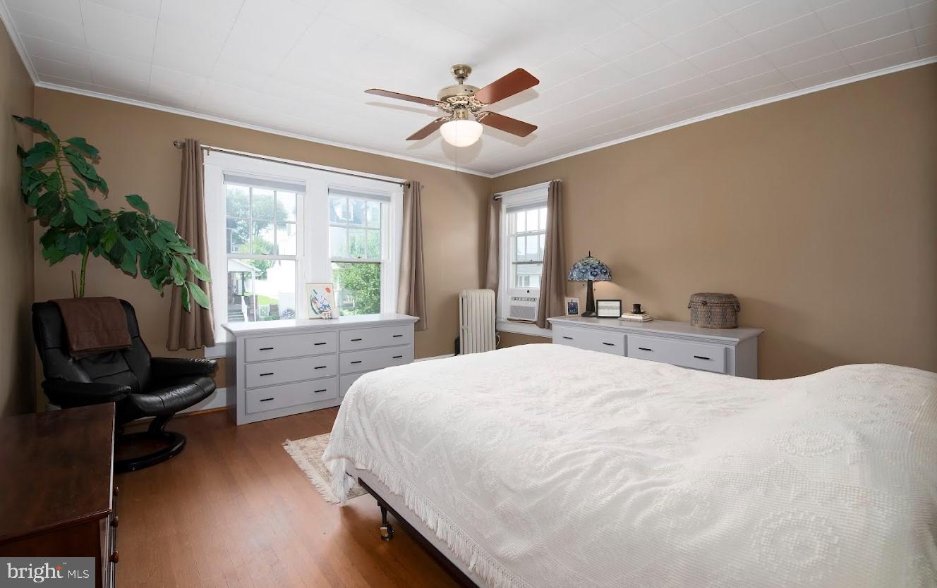 1505 3rd Avenue York, PA 17403 - Photo 6 of 12 a bedroom with a large bed and a window