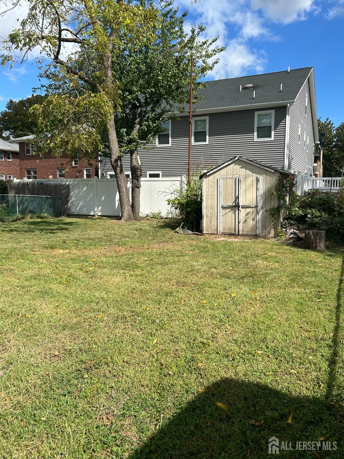 239 North 10th Street Kenilworth, NJ 07033 - Photo 6 of 8 a view of a house with a yard