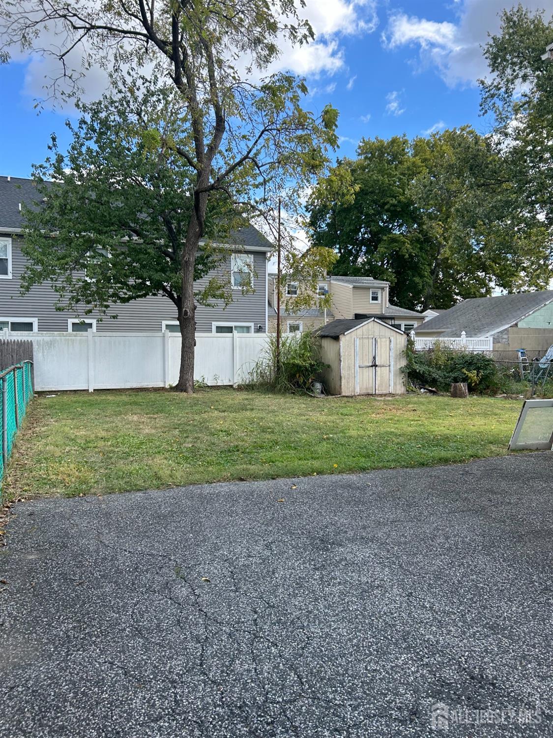 239 North 10th Street Kenilworth, NJ 07033 - Photo 7 of 8 a view of a house with a yard