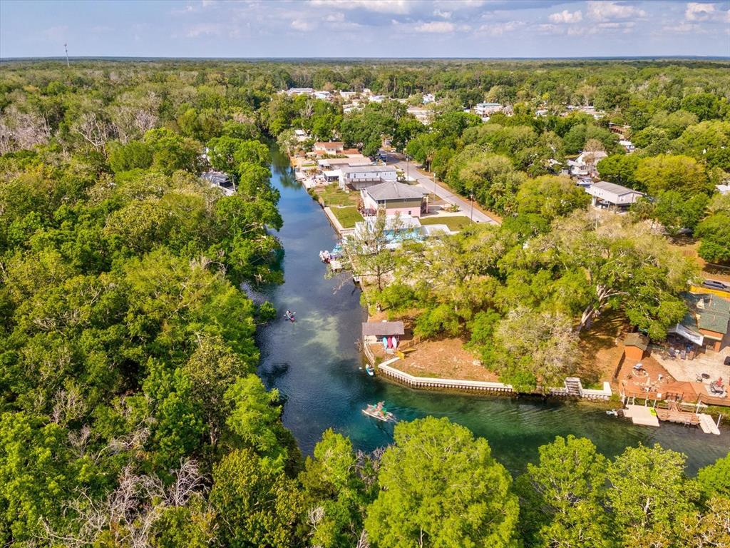 11981 Robina Road Weeki Wachee, FL 34614 - Photo 91 of 93 a view of a lake with a city