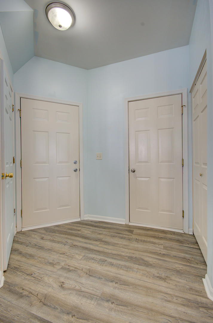1938 West Cobblestone Road Romeoville, IL 60446 - Photo 6 of 30 wooden floor in an empty room