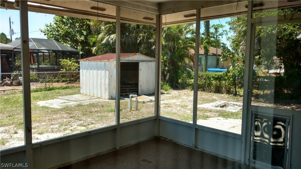 7550 Garry Road Fort Myers, FL 33967 - Photo 18 of 23 a view of a garden from a window