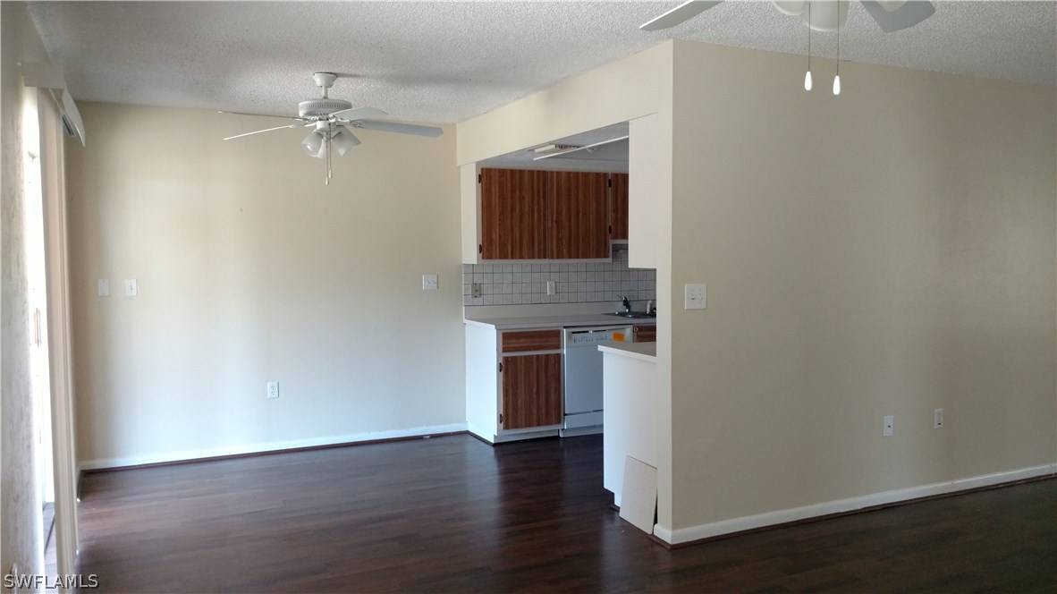 7550 Garry Road Fort Myers, FL 33967 - Photo 6 of 23 wooden floor in an empty room
