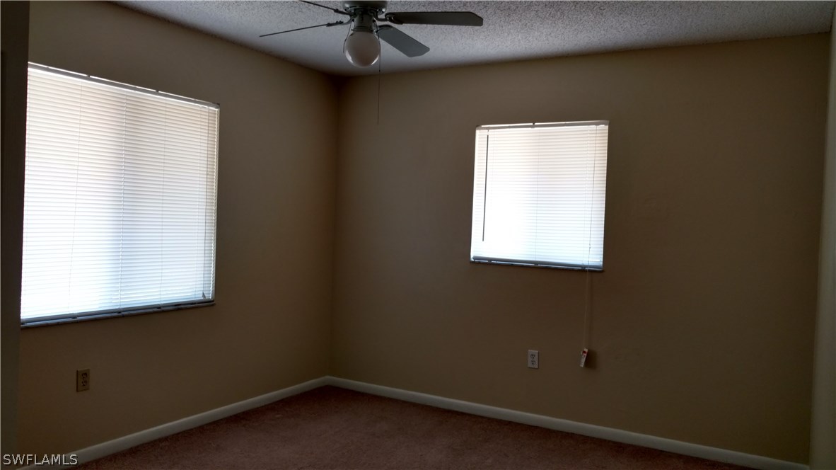 7550 Garry Road Fort Myers, FL 33967 - Photo 9 of 23 an empty room with a window