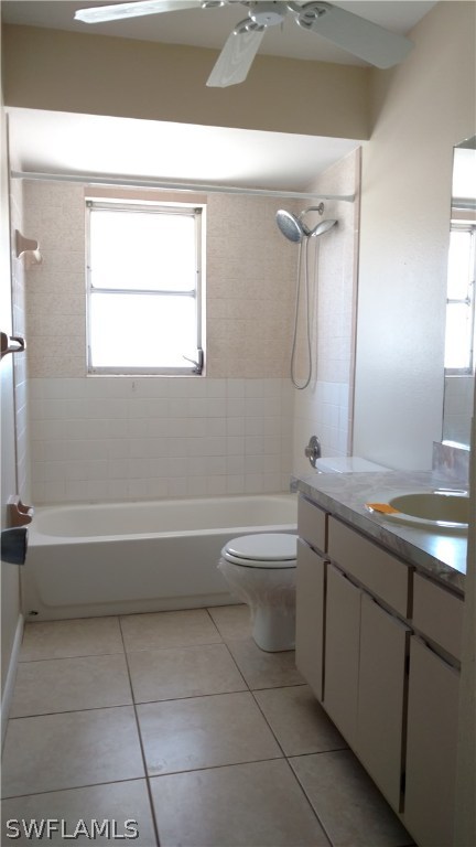 7550 Garry Road Fort Myers, FL 33967 - Photo 10 of 23 a bathroom with a granite countertop sink a toilet and a bathtub