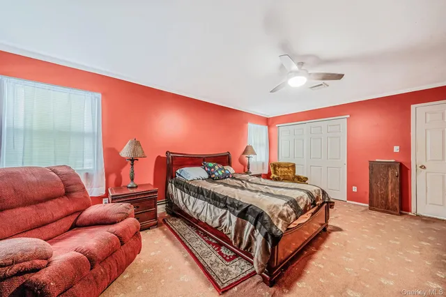 a bed room with a bed and a couch