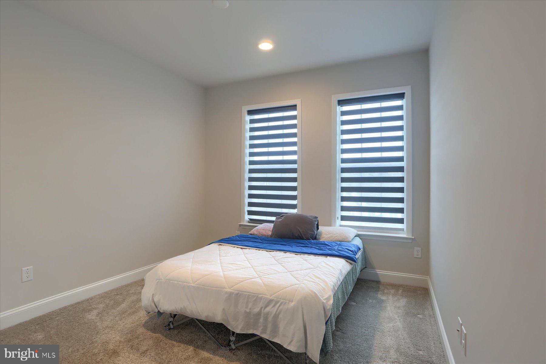 3219 Wayland Road Mechanicsburg, PA 17055 - Photo 23 of 38 a bedroom with a bed and a window