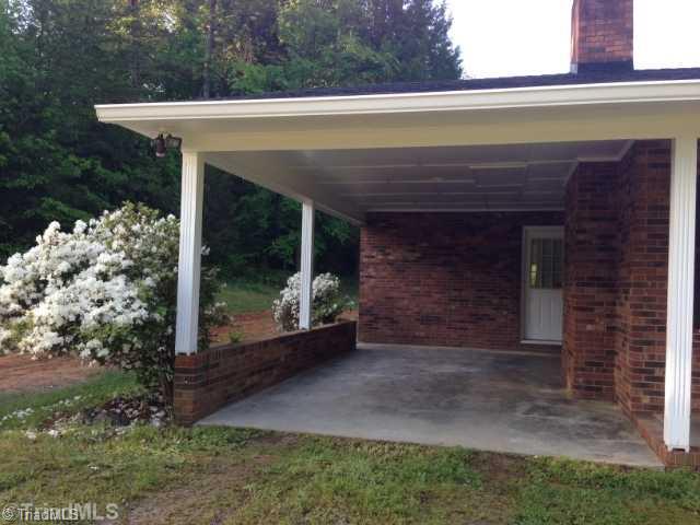 245 Jarvis Road Advance, NC 27006 - Photo 12 of 13 Other. Covered carport easily doubles for a patio or alternate needed space with indoor access