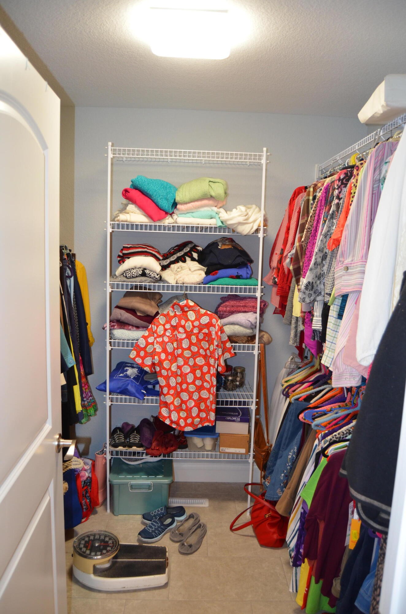 1039 Plateau Road Crossville, TN 38571 - Photo 23 of 40 a room with lots of different colored cloths