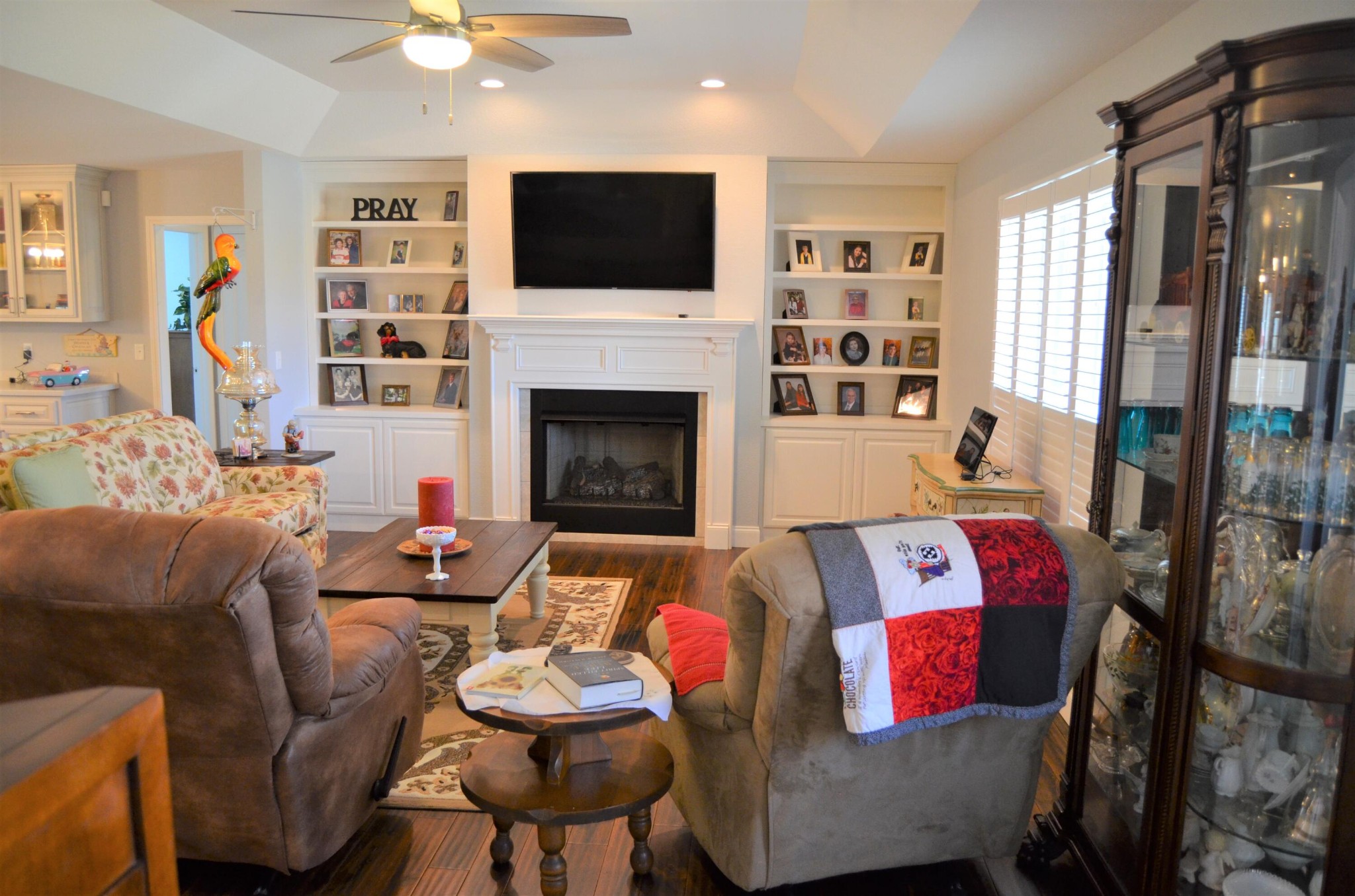 1039 Plateau Road Crossville, TN 38571 - Photo 9 of 40 a living room with furniture a flat screen tv and a fireplace