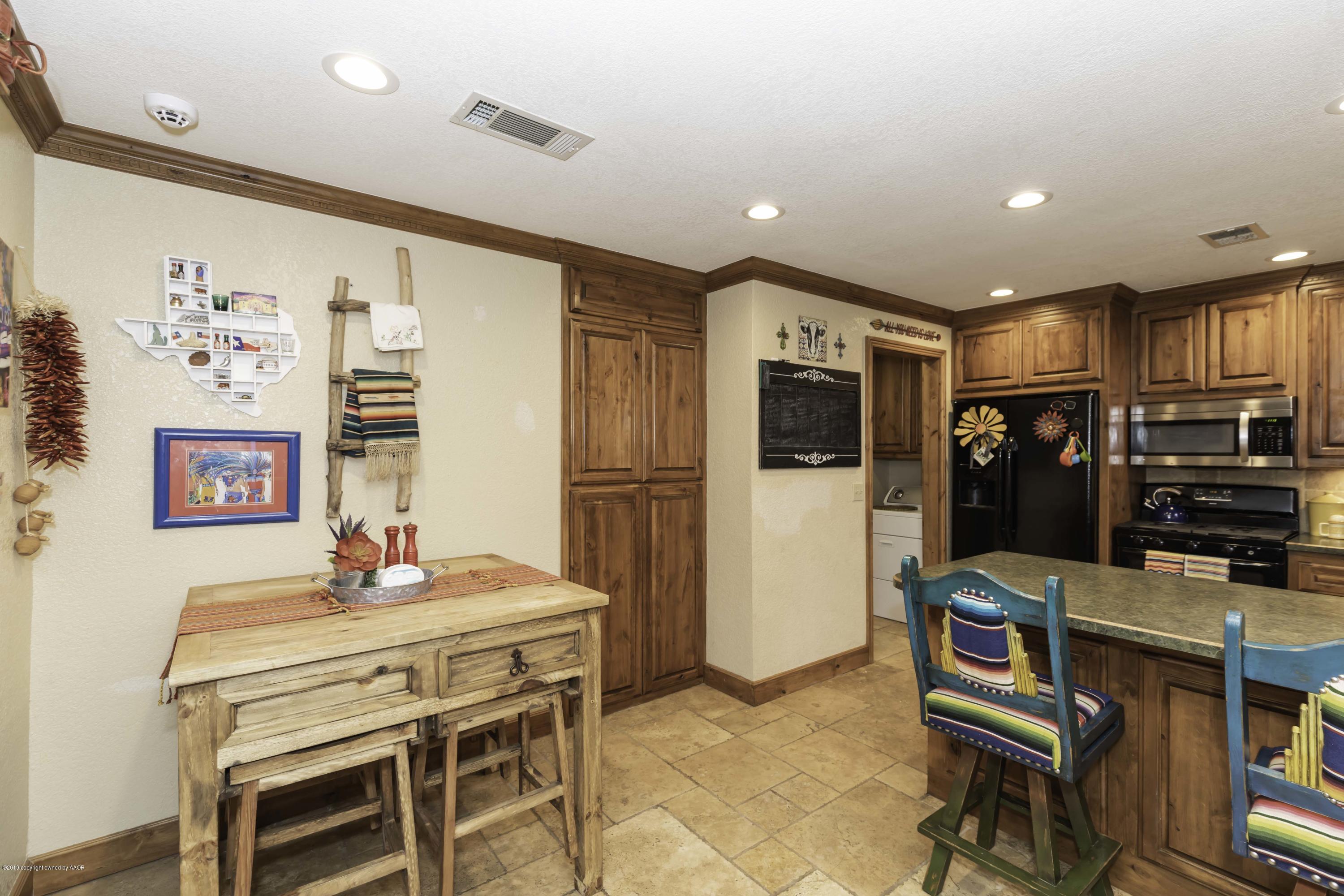 5308 Wheeler Lane Amarillo, TX 79110 - Photo 14 of 41 a dining room with furniture and window