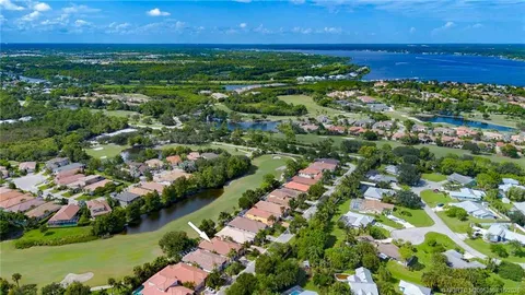 a view of a entryway with furniture and floor to ceiling window