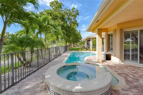 a room with furniture and wooden floor