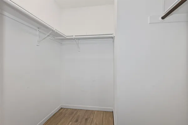 a view of a room with racks on the wall