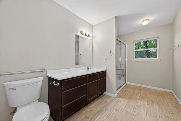 a bathroom with a sink and a toilet
