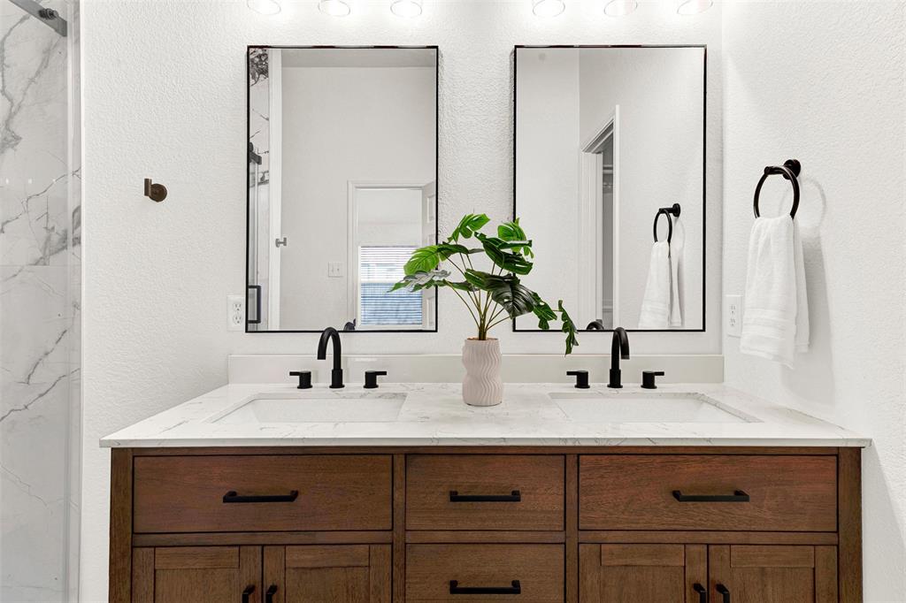3601 Cottonwood Road Melissa, TX 75454 - Photo 15 of 36 a bathroom with a sink and a mirror
