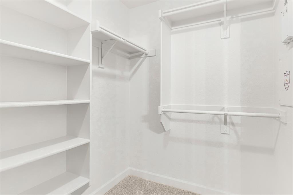 3601 Cottonwood Road Melissa, TX 75454 - Photo 18 of 36 a view of an empty walk in closet