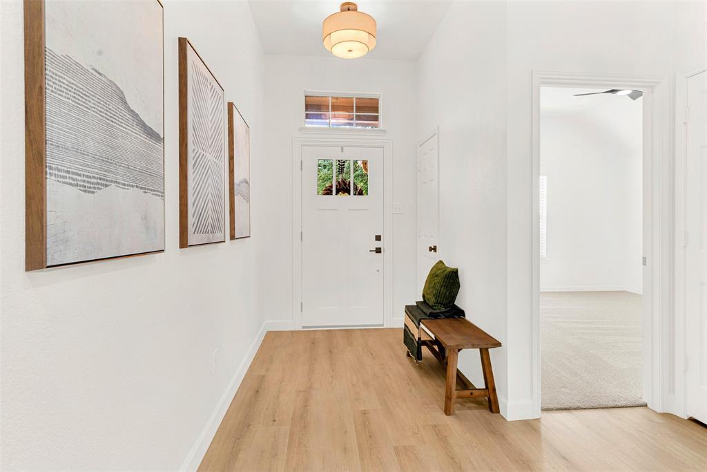3601 Cottonwood Road Melissa, TX 75454 - Photo 19 of 36 a room with a window and a rug