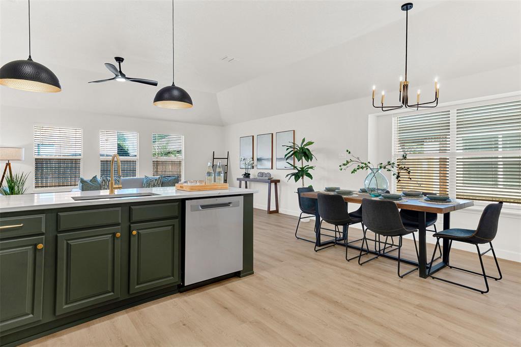 3601 Cottonwood Road Melissa, TX 75454 - Photo 6 of 36 a kitchen with a table and chairs in it