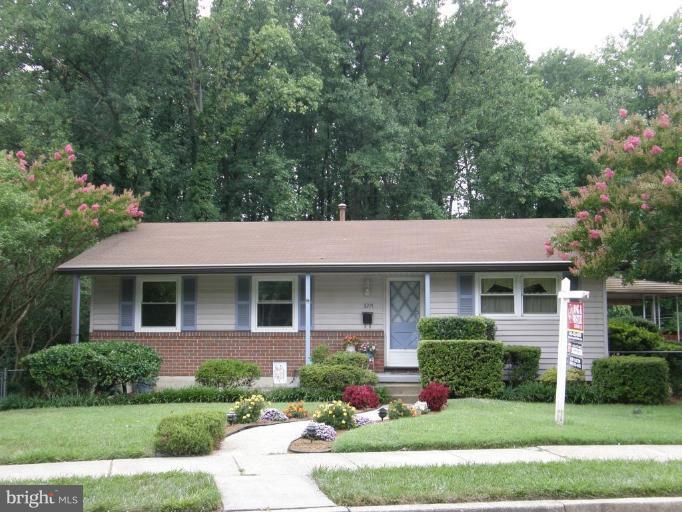 6221 Commons Road Rosedale, MD 21237 - Photo 1 of 27 a front view of a house with a yard