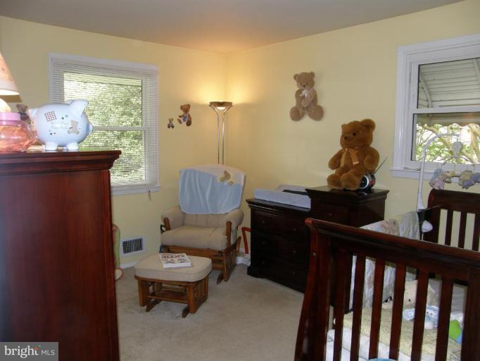 6221 Commons Road Rosedale, MD 21237 - Photo 11 of 27 a living room with furniture and a window
