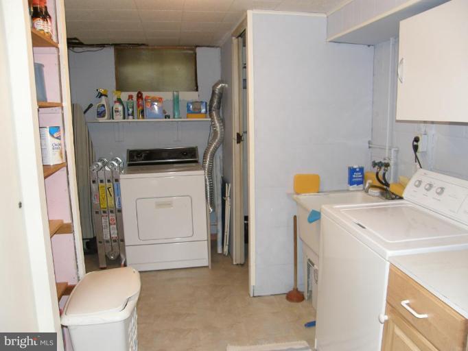 6221 Commons Road Rosedale, MD 21237 - Photo 14 of 27 a utility room with dryer and washer