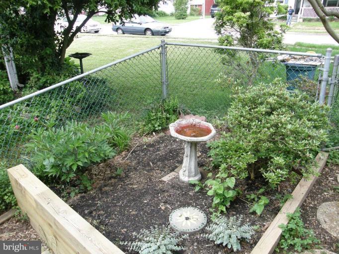 6221 Commons Road Rosedale, MD 21237 - Photo 20 of 27 a view of a fountain in the balcony