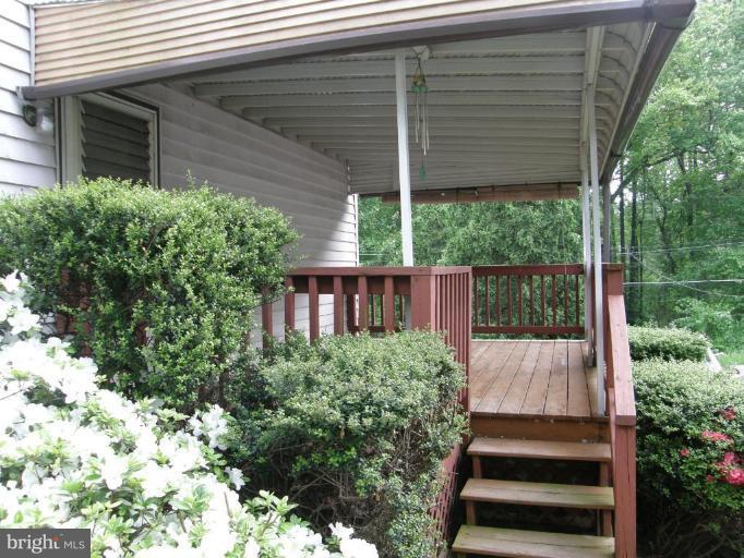 6221 Commons Road Rosedale, MD 21237 - Photo 26 of 27 a view of a small yard front of house