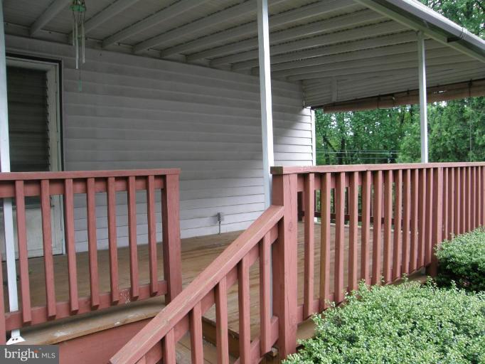 6221 Commons Road Rosedale, MD 21237 - Photo 27 of 27 a view of a backyard with potted plants