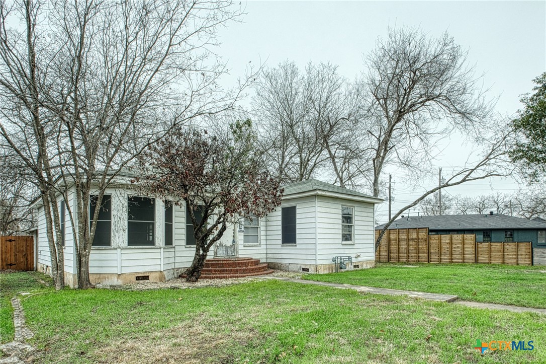 2805 Breeze Terrace Austin, TX 78722 - Photo 1 of 1 a view of a house with a yard