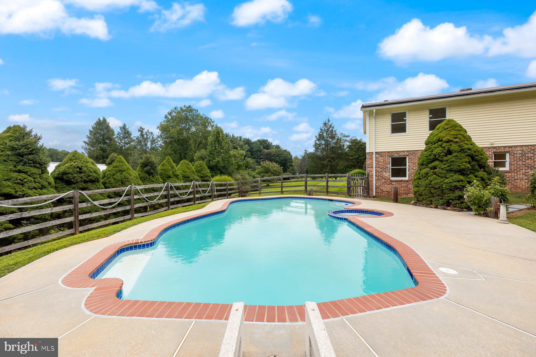 18604 Muncaster Road Rockville, MD 20855 - Photo 11 of 90 a view of swimming pool with seating space