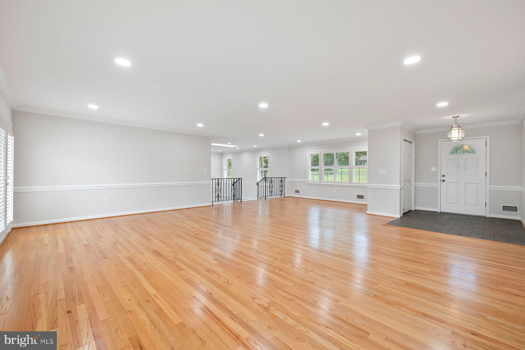 18604 Muncaster Road Rockville, MD 20855 - Photo 18 of 90 a view of empty room with wooden floor