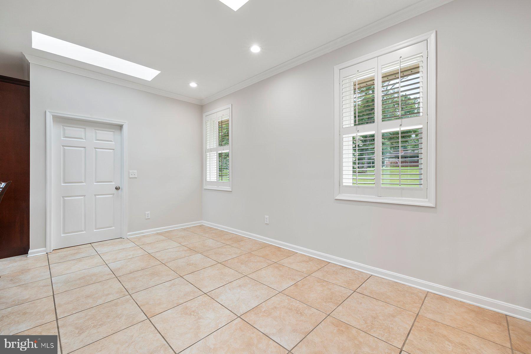 18604 Muncaster Road Rockville, MD 20855 - Photo 33 of 90 a view of an empty room and window