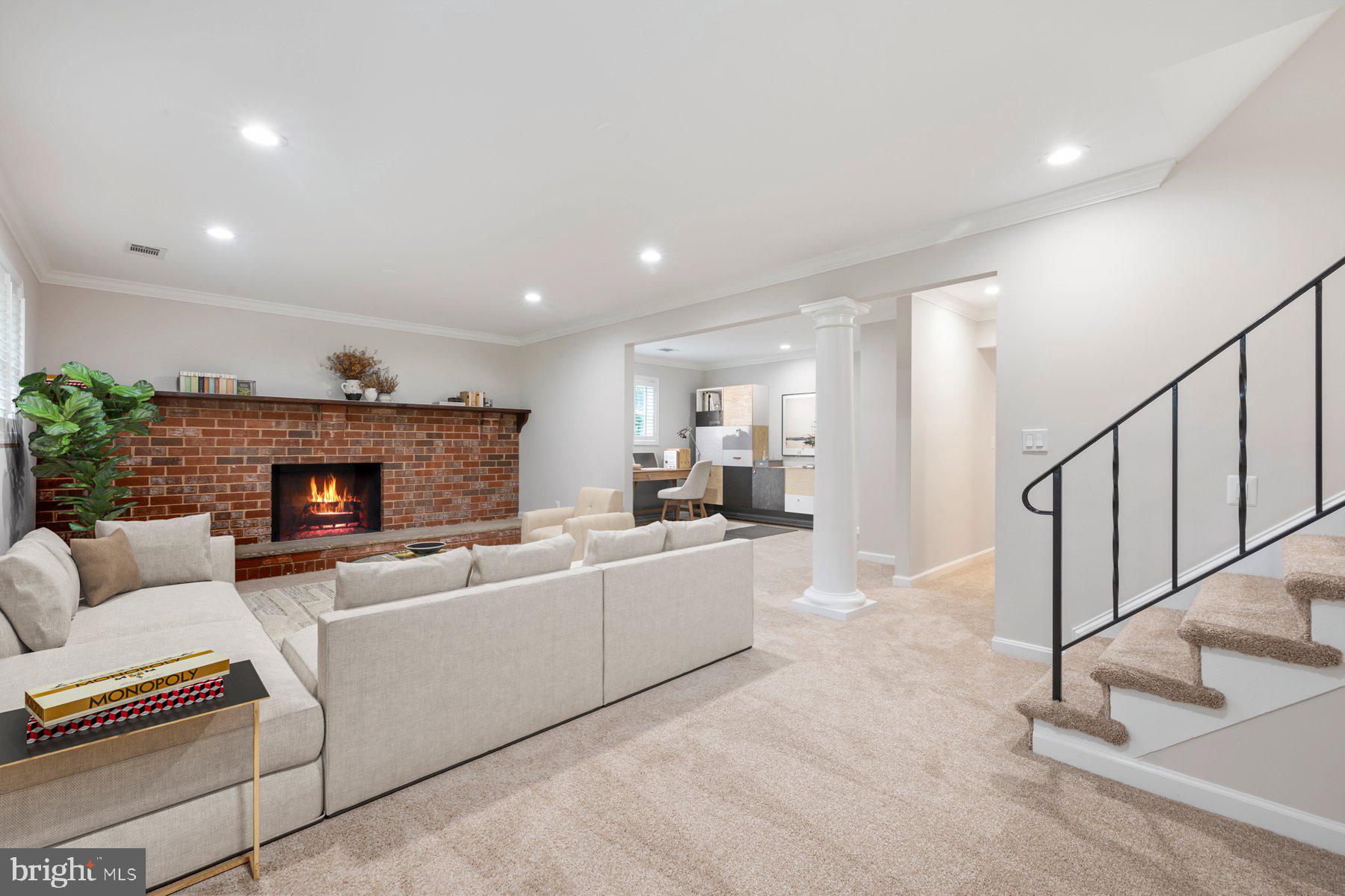 18604 Muncaster Road Rockville, MD 20855 - Photo 55 of 90 a living room with furniture and a fireplace