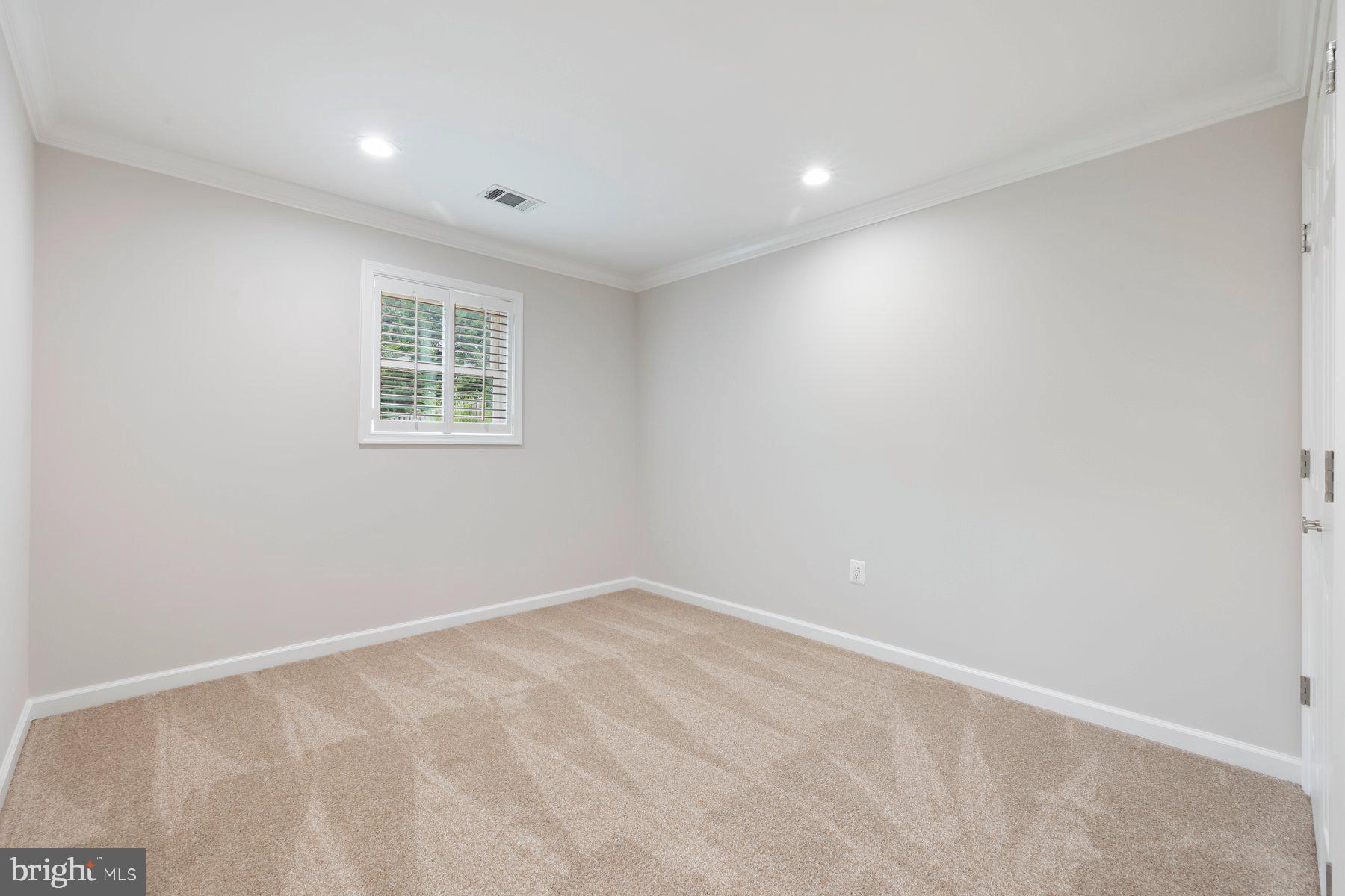 18604 Muncaster Road Rockville, MD 20855 - Photo 60 of 90 an empty room with windows