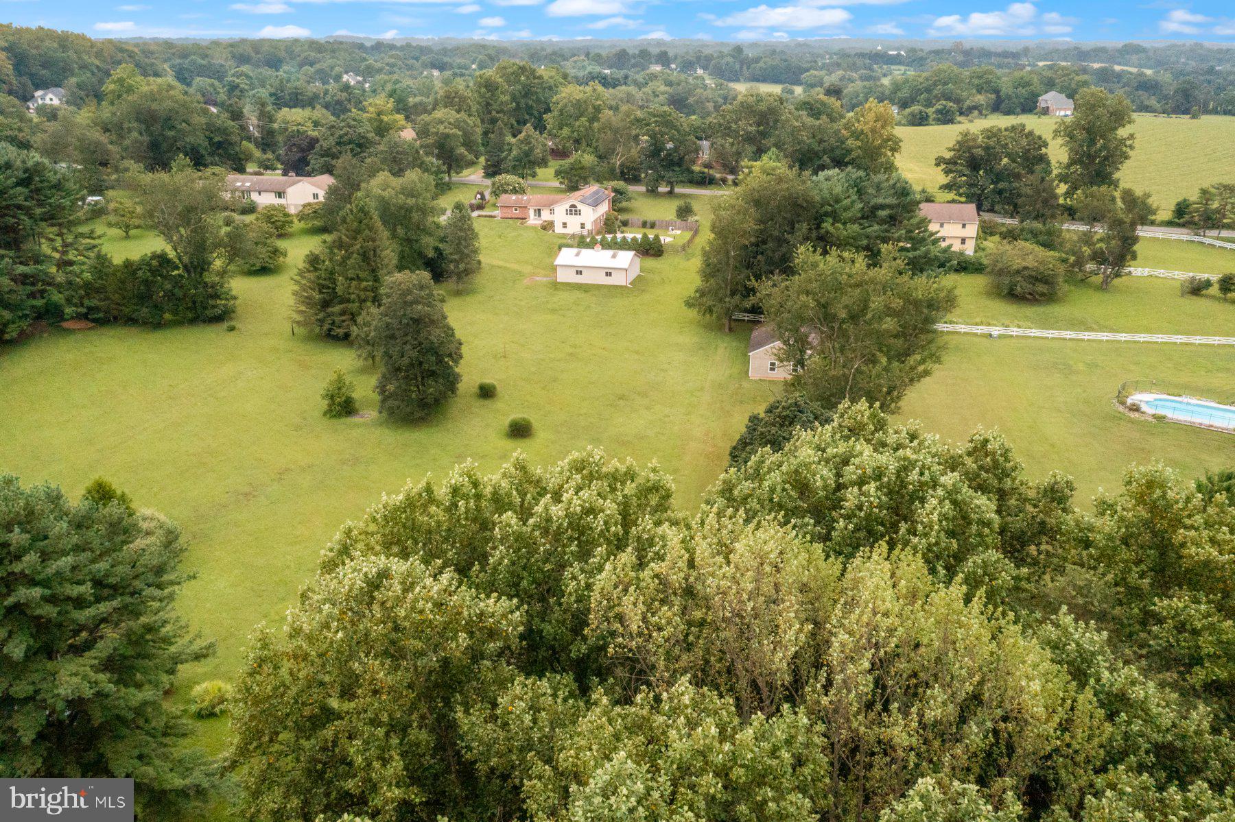 18604 Muncaster Road Rockville, MD 20855 - Photo 84 of 90 an aerial view of residential houses with outdoor space