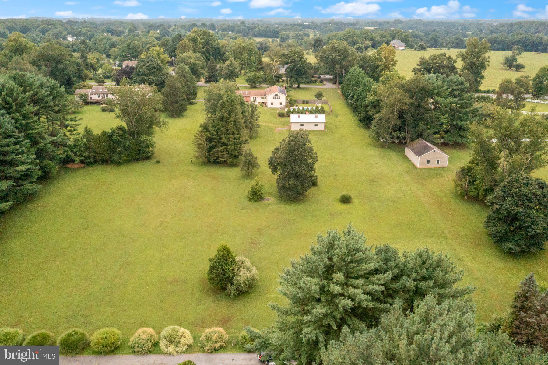 18604 Muncaster Road Rockville, MD 20855 - Photo 85 of 90 an aerial view of residential houses with outdoor space