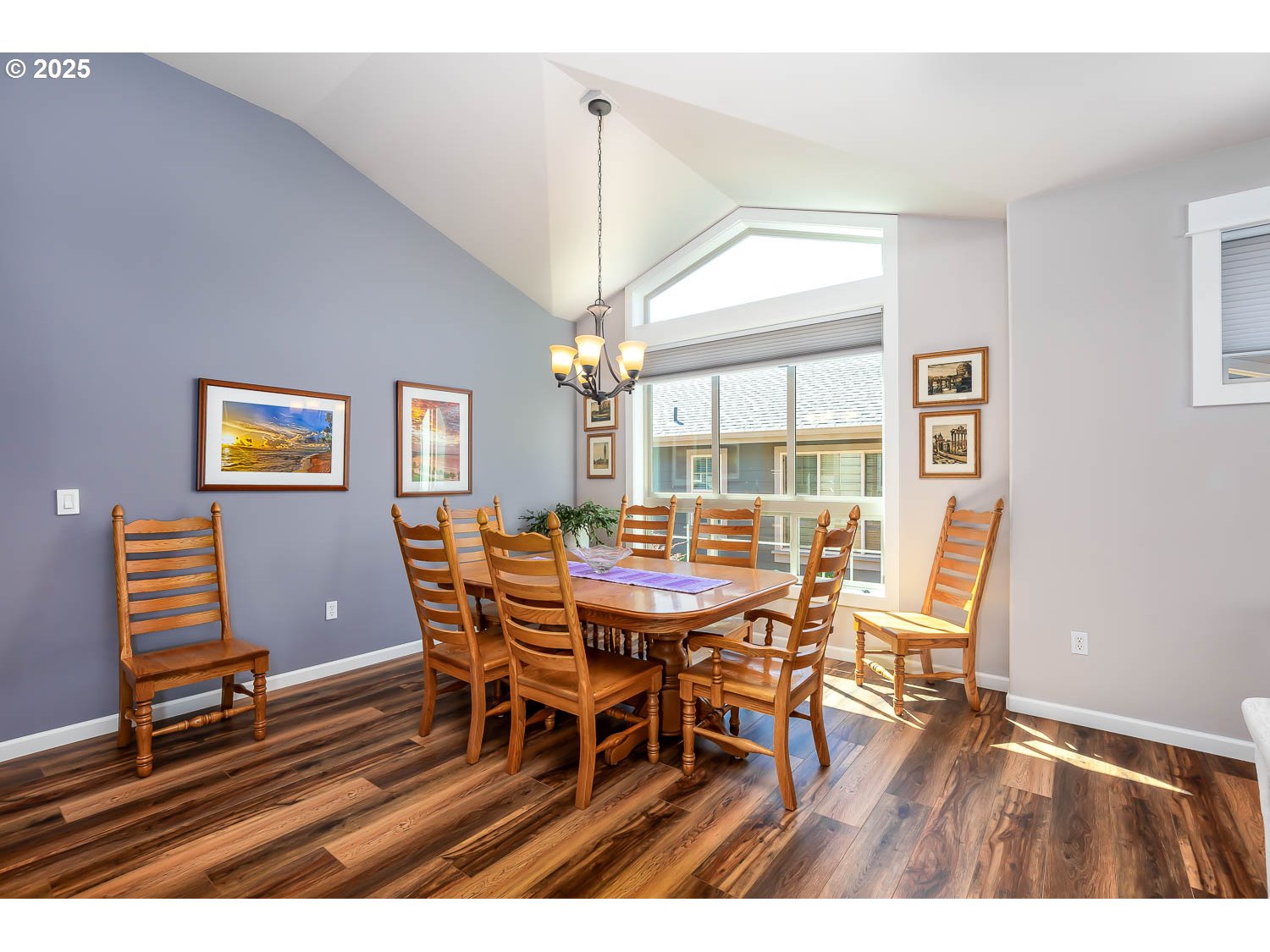 8413 Forest Ridge Loop Redmond, OR 97756 - Photo 13 of 40 a view of a dining room with furniture wooden floor and chandelier